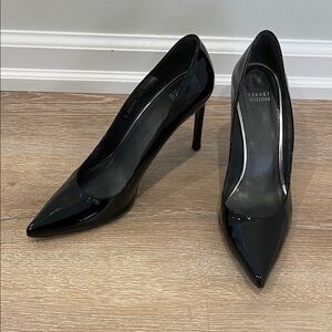 Stuart Weitzman Black patent leather pumps. Lightly worn, very good condition.